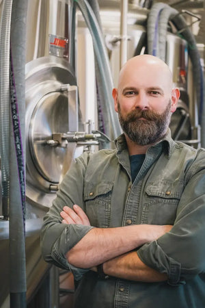 Dildo Brewing Co. Head Brewer, Al Goodyear, standing proudly at the brewery.